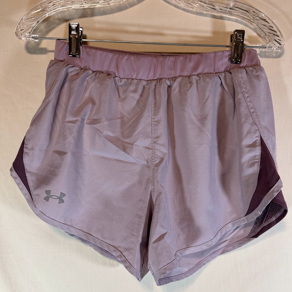 Under Armour Women’s purple lined heat gear shorts with pocket S